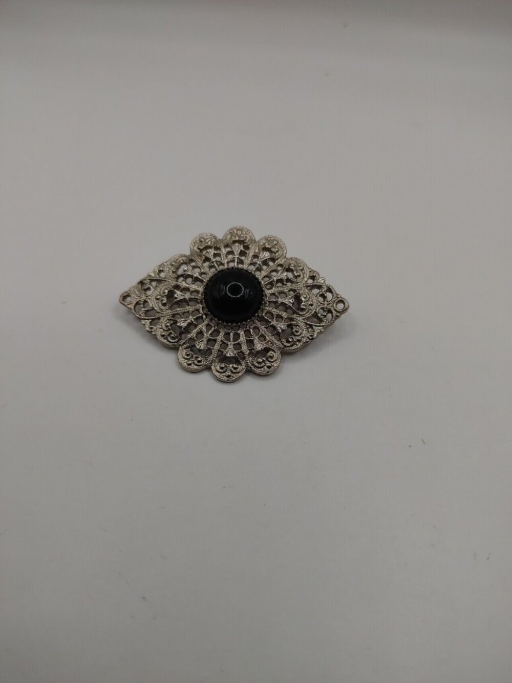 VTG  BROOCH/PIN  Silver- tone filigree  w/black center stone